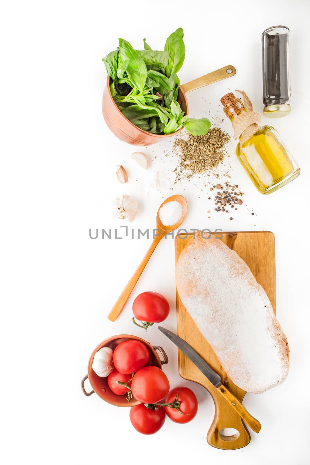 Ingredients for  bruschetta on the white background vertical