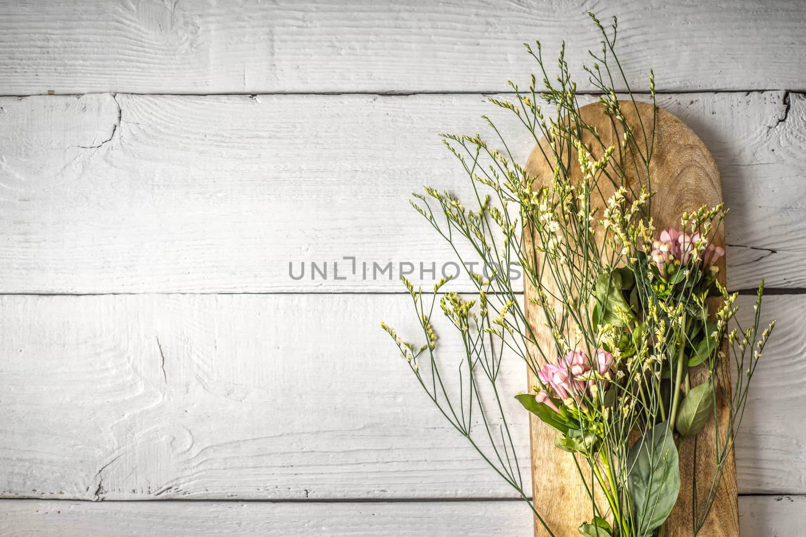 Summer flowers bouquet on the wooden board top view by Deniskarpenkov