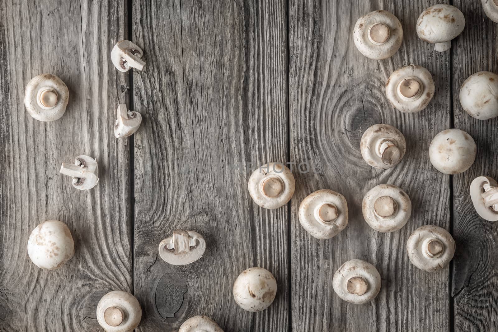 Champignon on the old wooden table top view