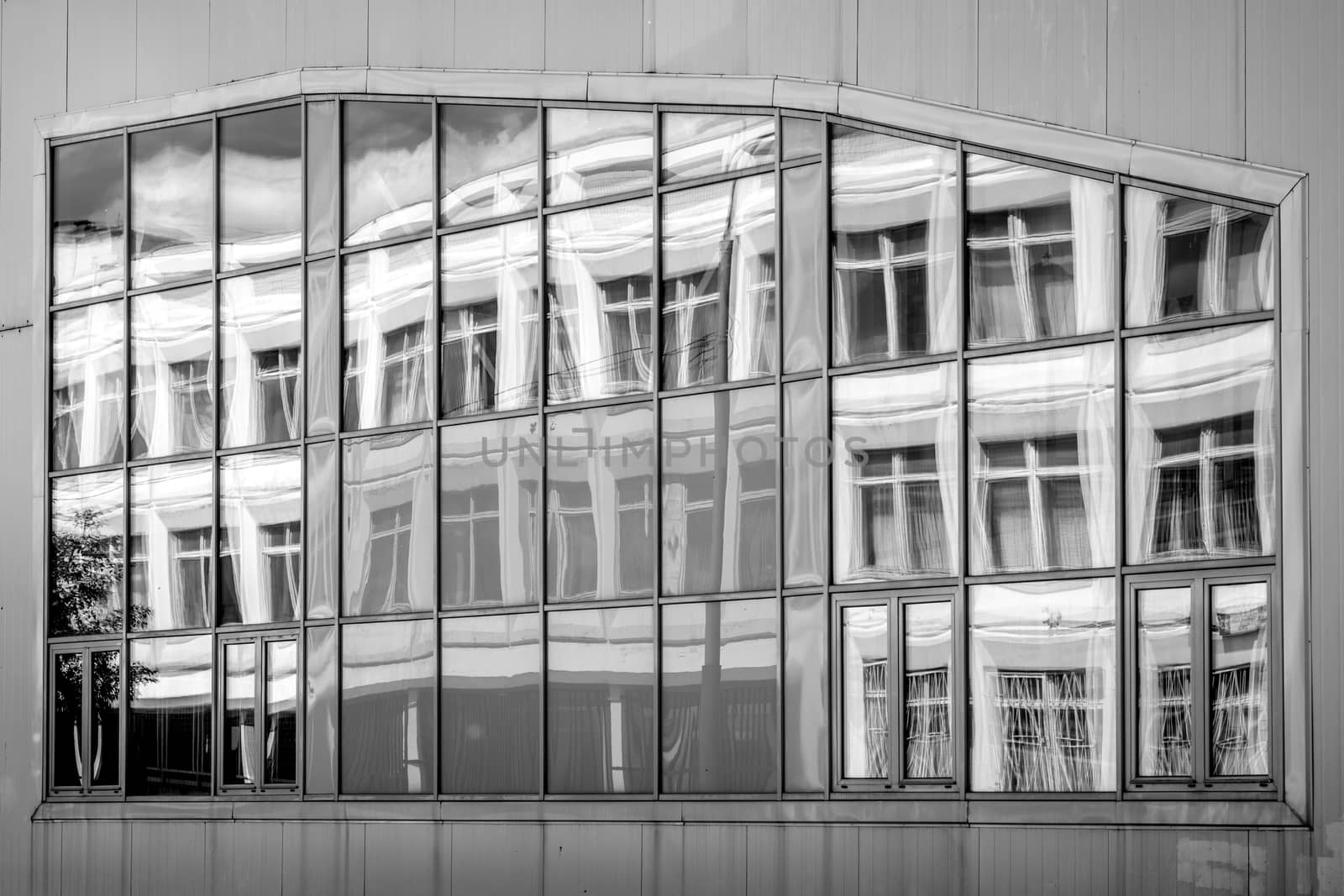 Window with building reflection black and white by Deniskarpenkov