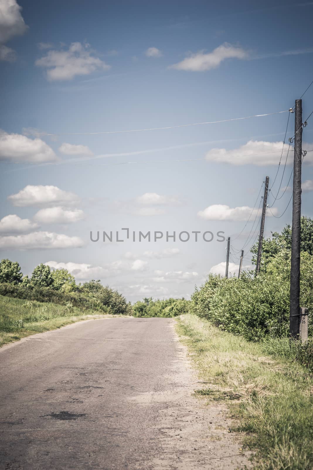 Country road with power line vertical by Deniskarpenkov