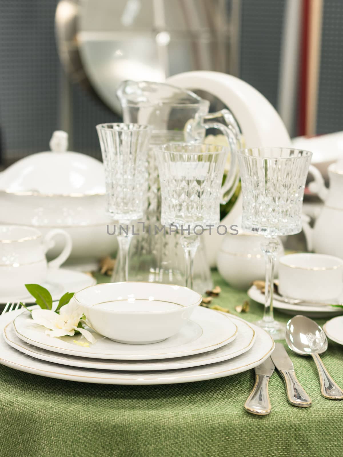 Set of dishes on table by fascinadora