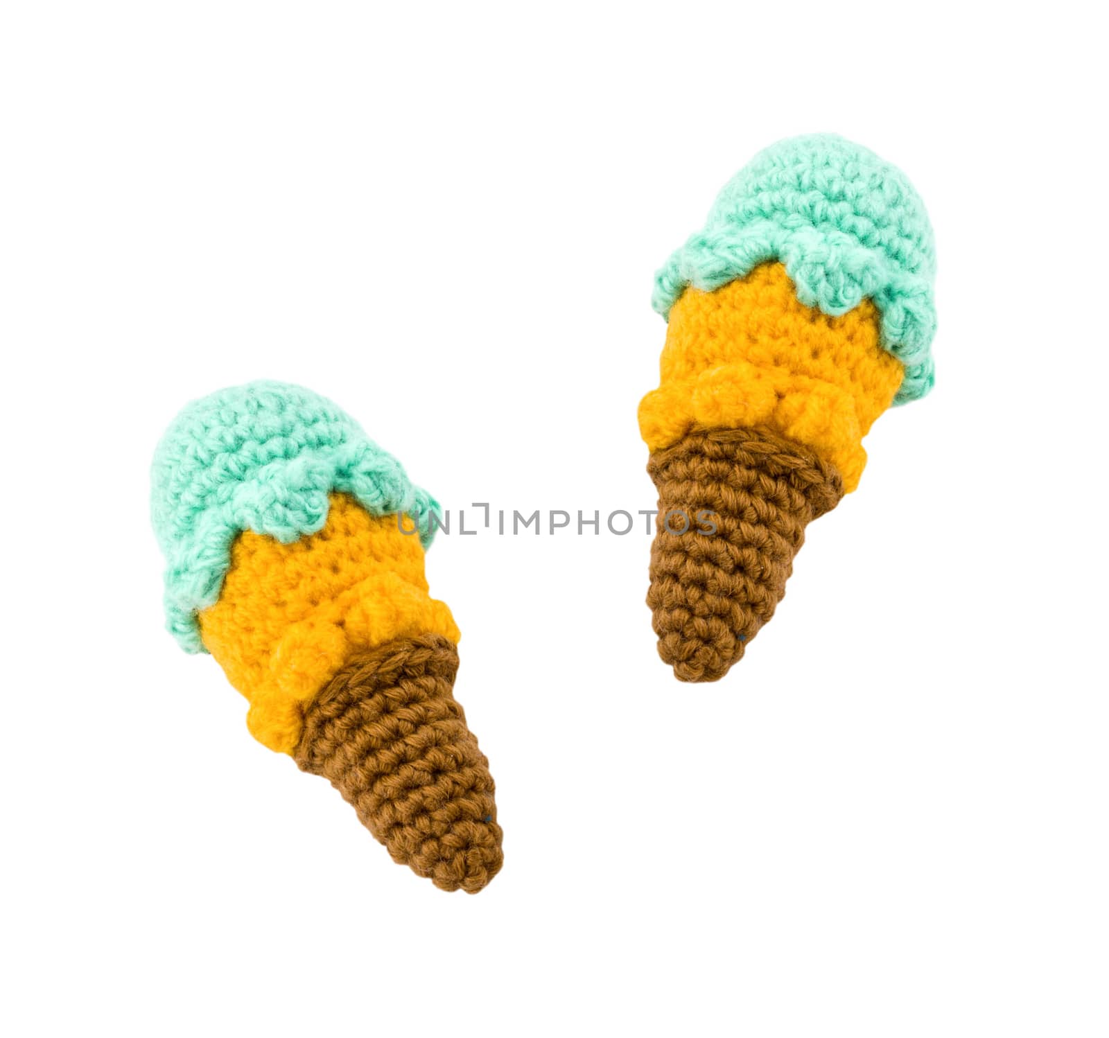 two different flavor ice creams with cone on white