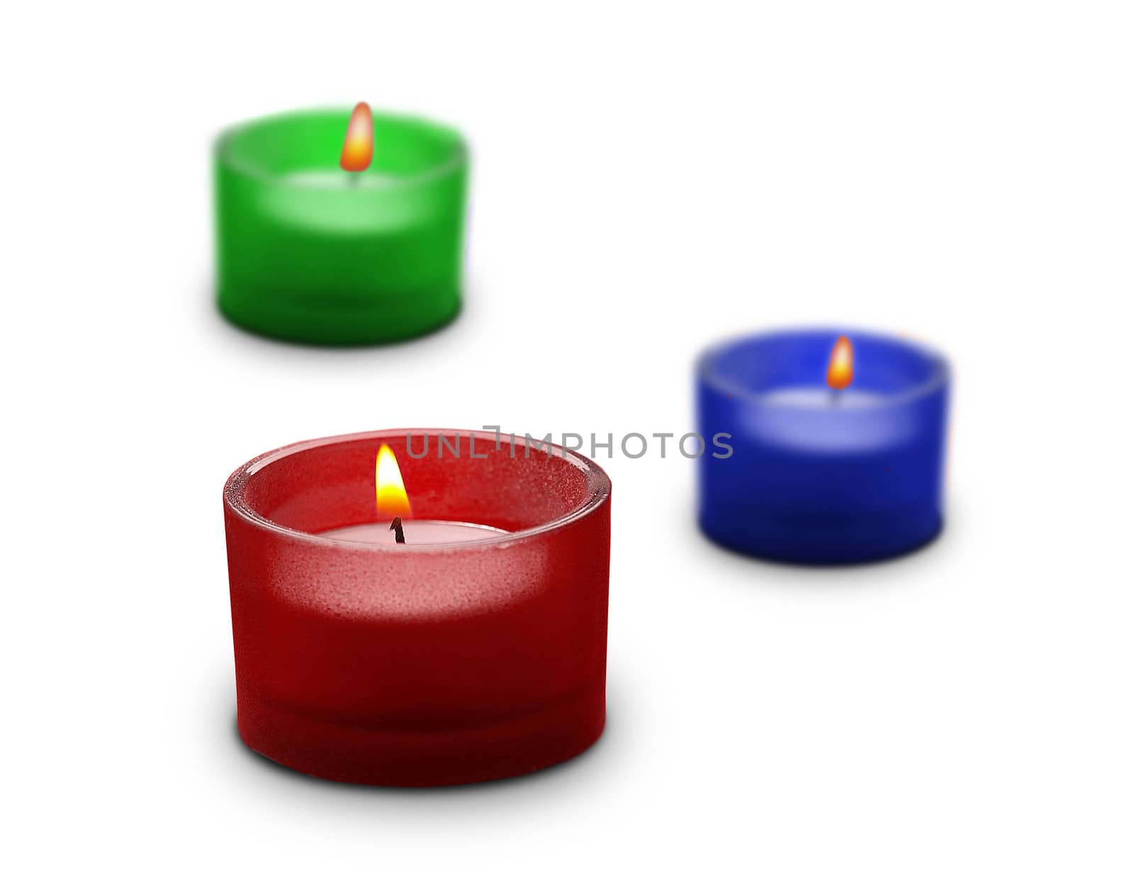 three candles isolated on white