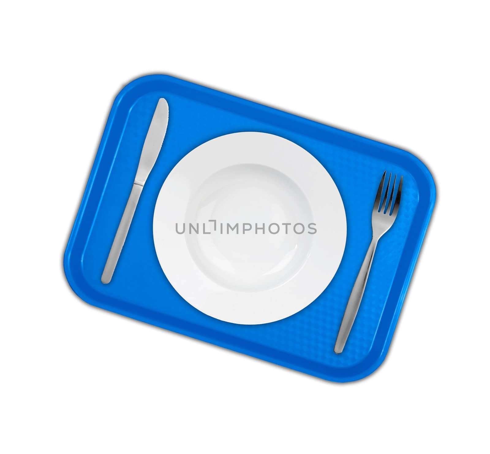 Set of utensils arranged on the table with plate