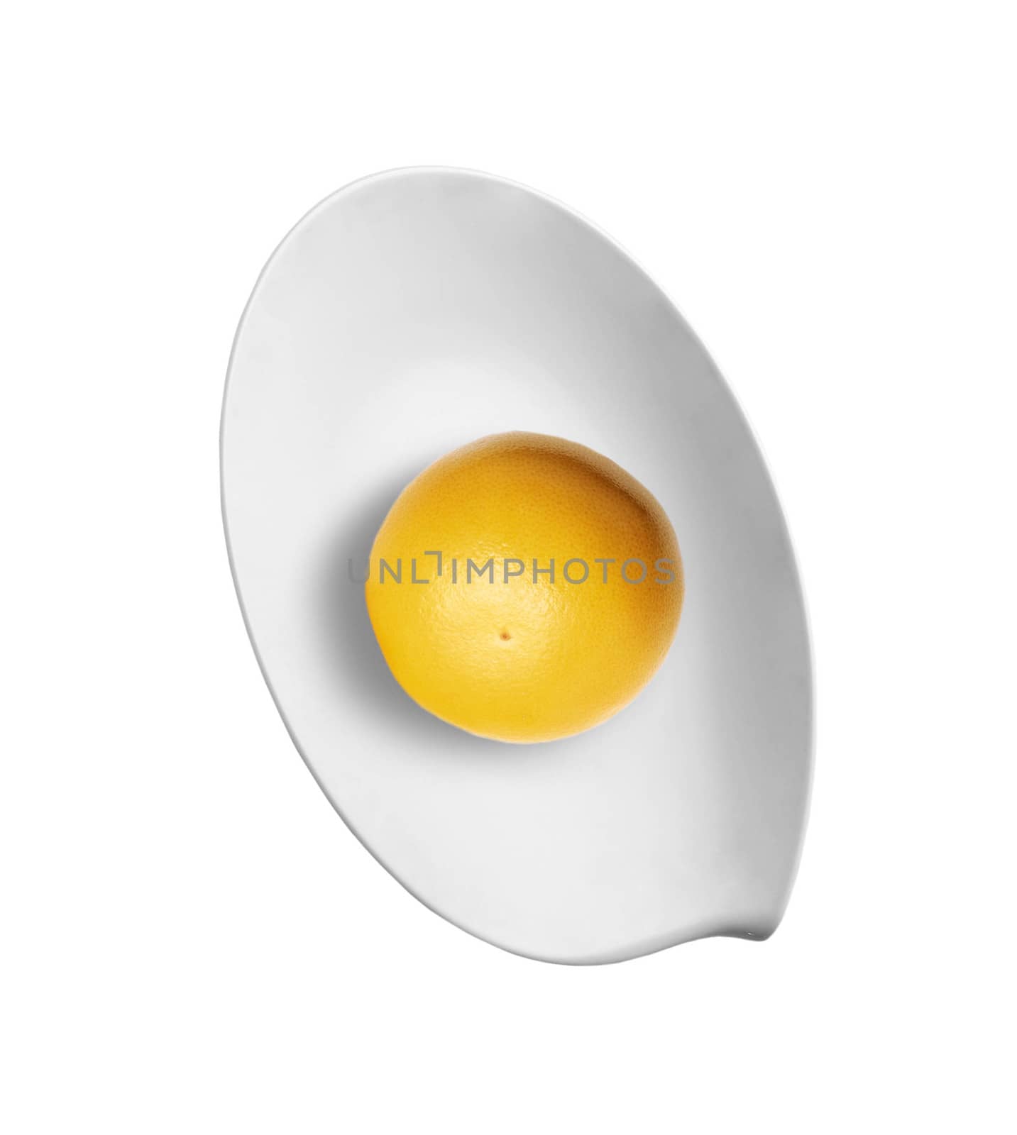lemon on plate isolated over white