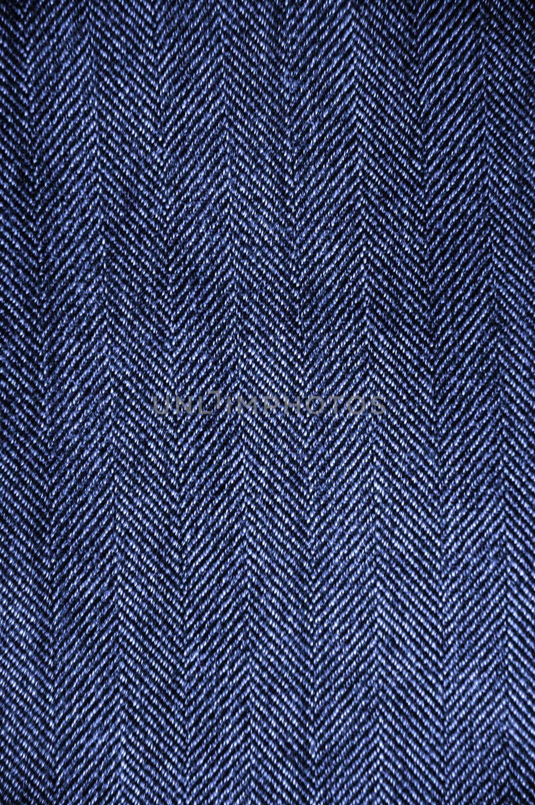 Texture of blue jeans as a background.