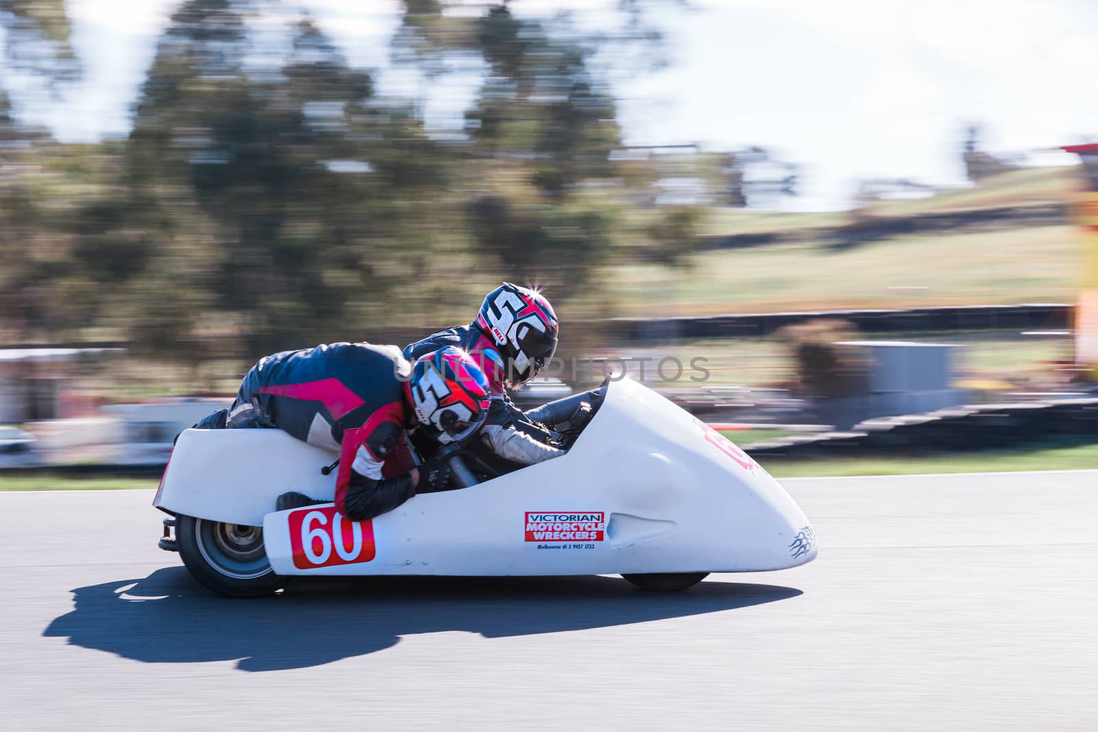 Motorcycle racers fight it out for the podium at the Hartwell Motorcycle Club Championship - Round 5 at Broadford Motorcycle Sports Complex in Victoria.