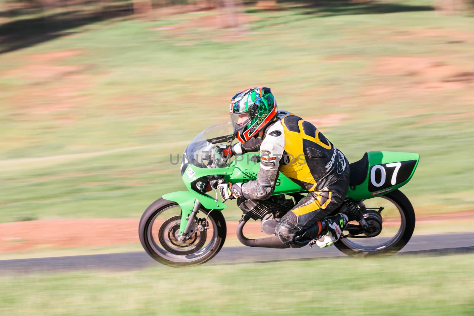 Motorcycle racers fight it out for the podium at the Hartwell Motorcycle Club Championship - Round 5 at Broadford Motorcycle Sports Complex in Victoria.