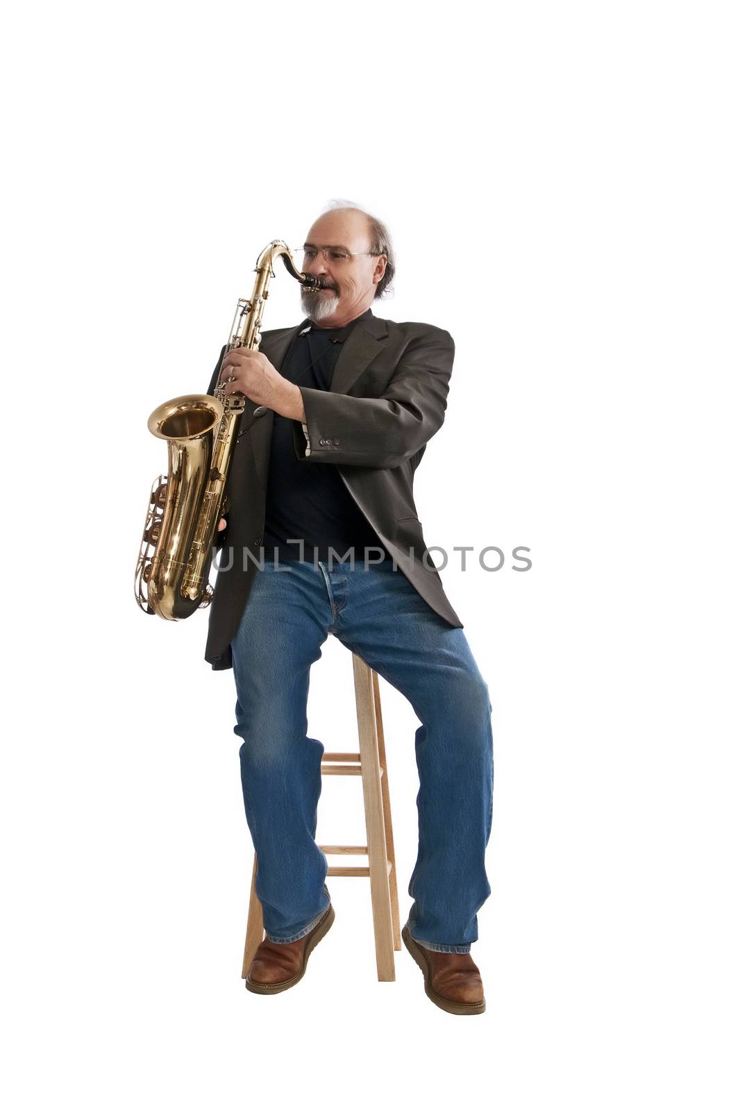 Adult male playing a tenor sax isolated on a white background.