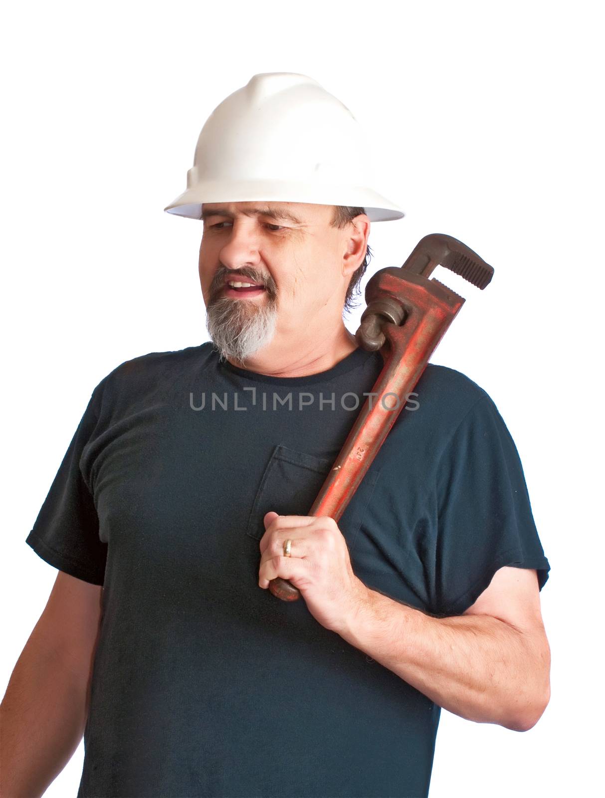 Male plumber ready to work on a new job