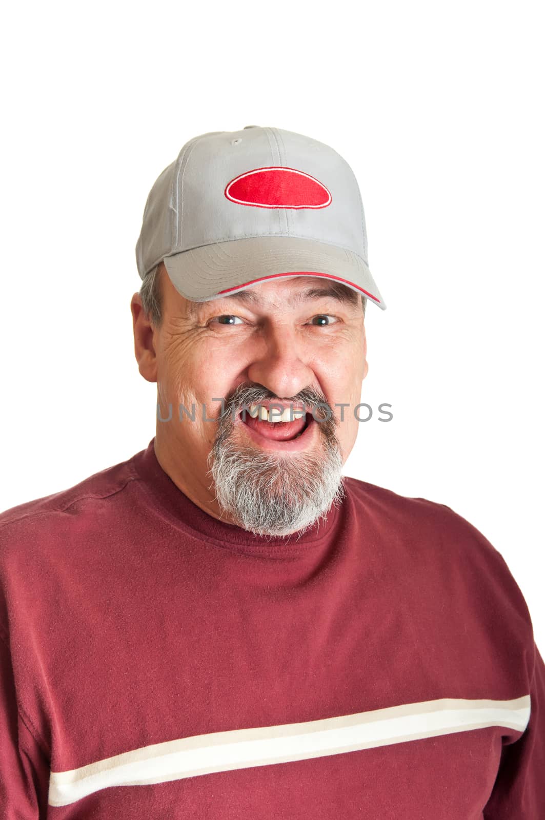 Mature adult male laughing at a funny story isolated on a white background.