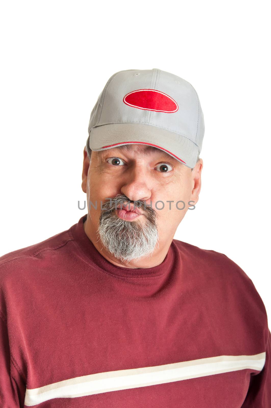 Adult male with a look of disbelief on his face as he listens to yet another tall tale from a friend.