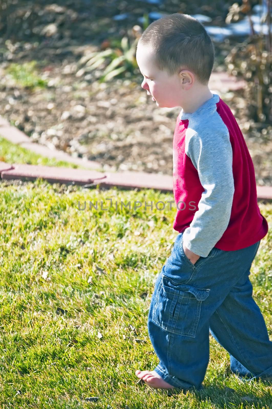 A little boy thinking over global warming, federal deficits and world hunger.