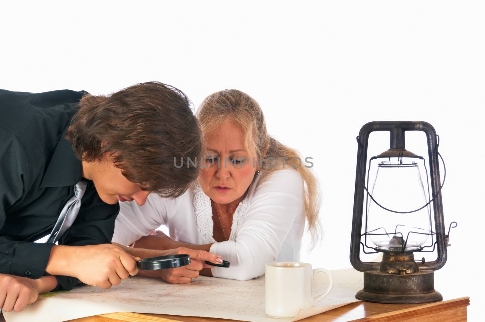 Two modern treasure hunters study a topo map to find clues to the location of valuable treasure. Isolated on a white background