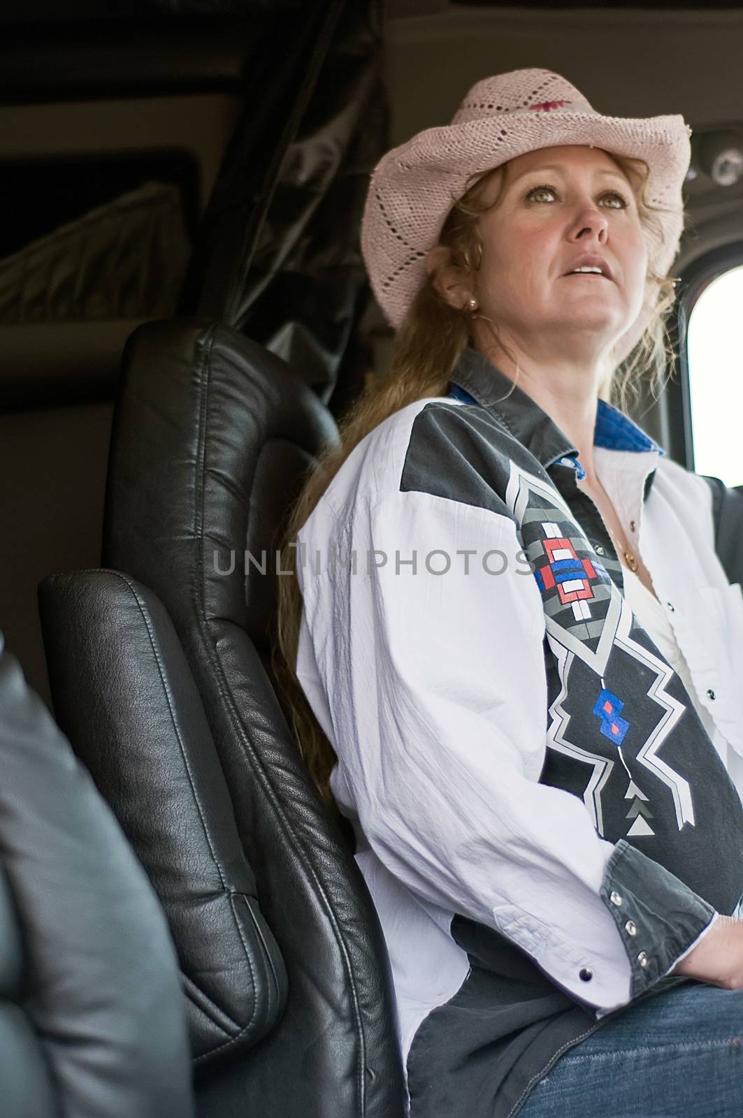 Woman Truck Driver Looking Ahead by rcarner
