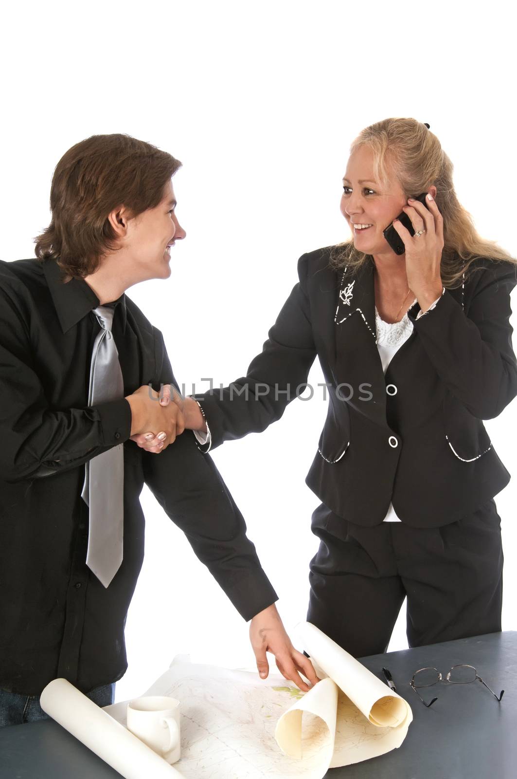 Businesswoman making a corporate decision while on the phone with an assosiate.