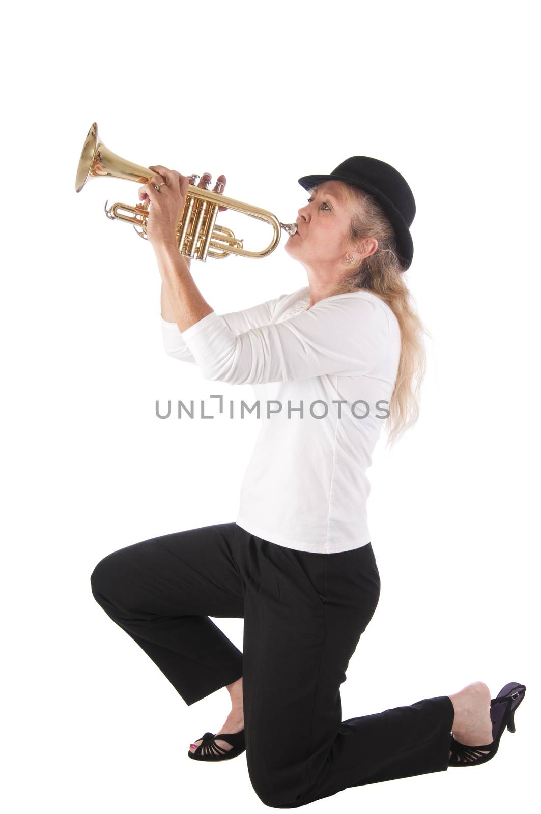 Pretty blonde woman playing blues on a trumpet. Isolated on white background