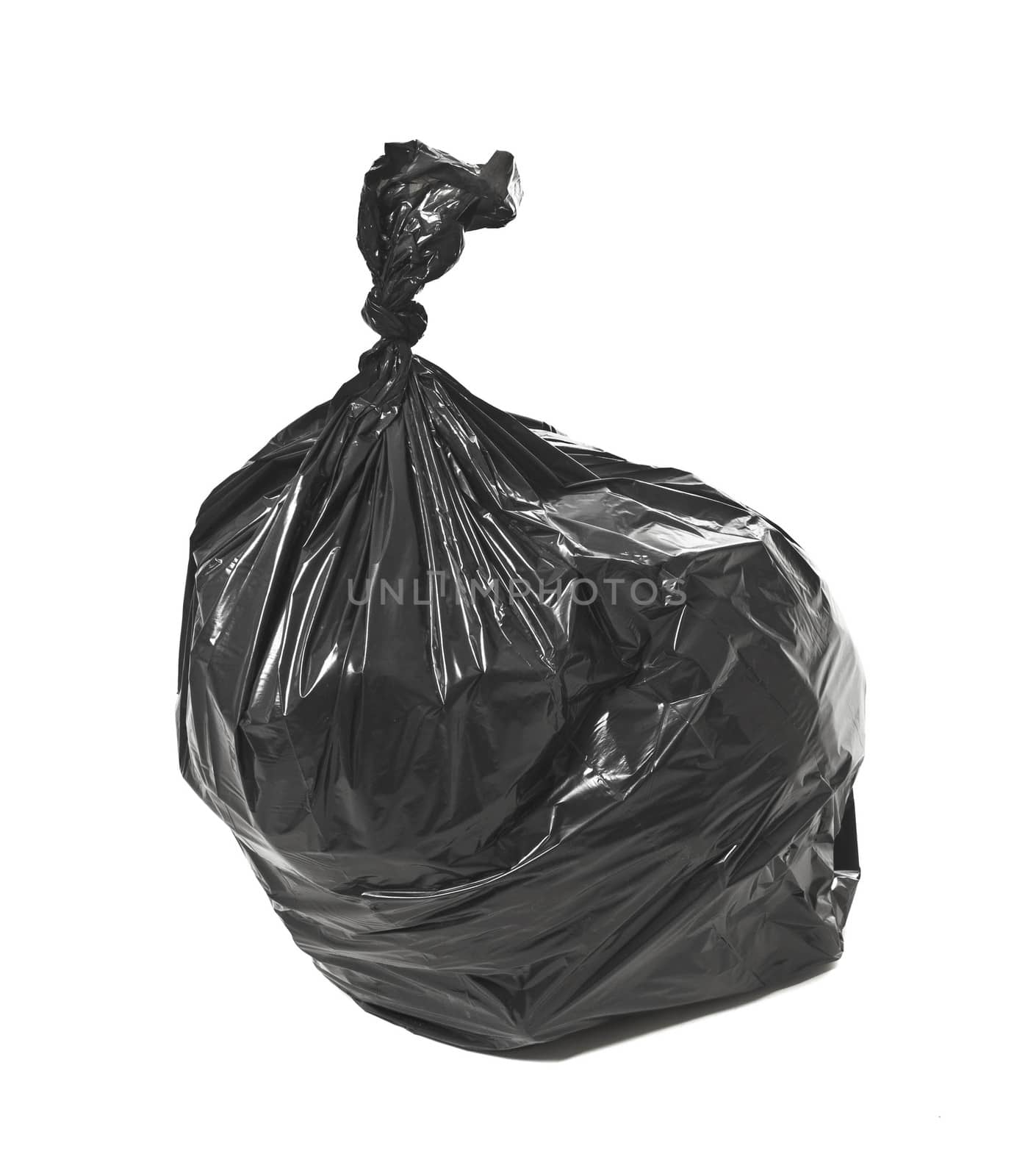 Black garbage bag isolated on white