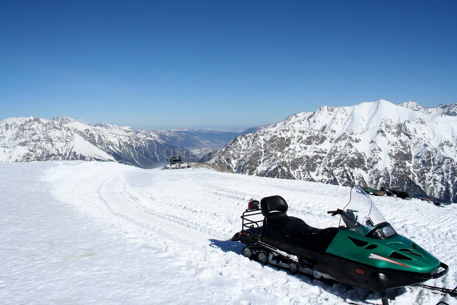Snowmobile in the mountains of Dombai, Caucasus