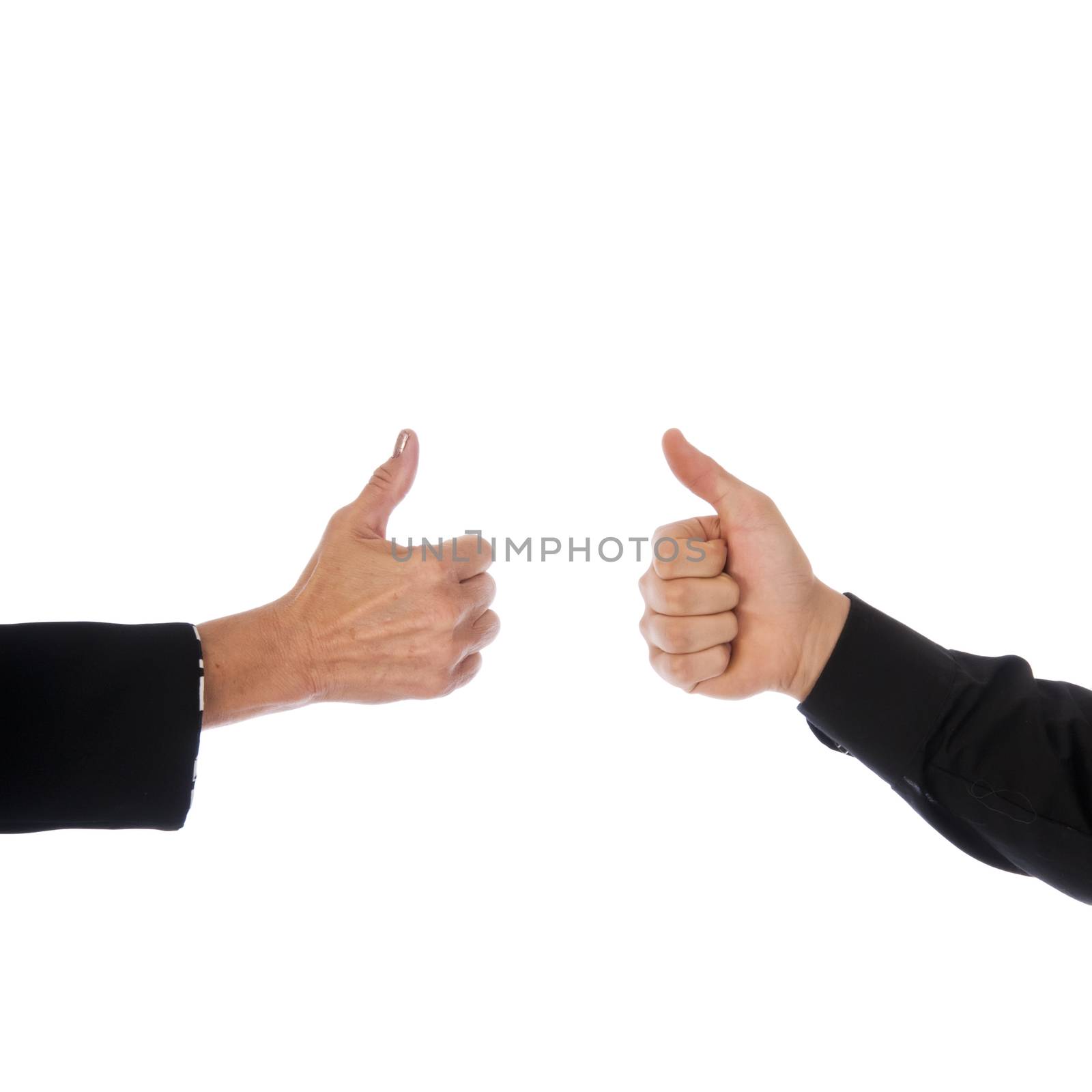 Hands of a man and a woman giving a thumbs up to show agreement.