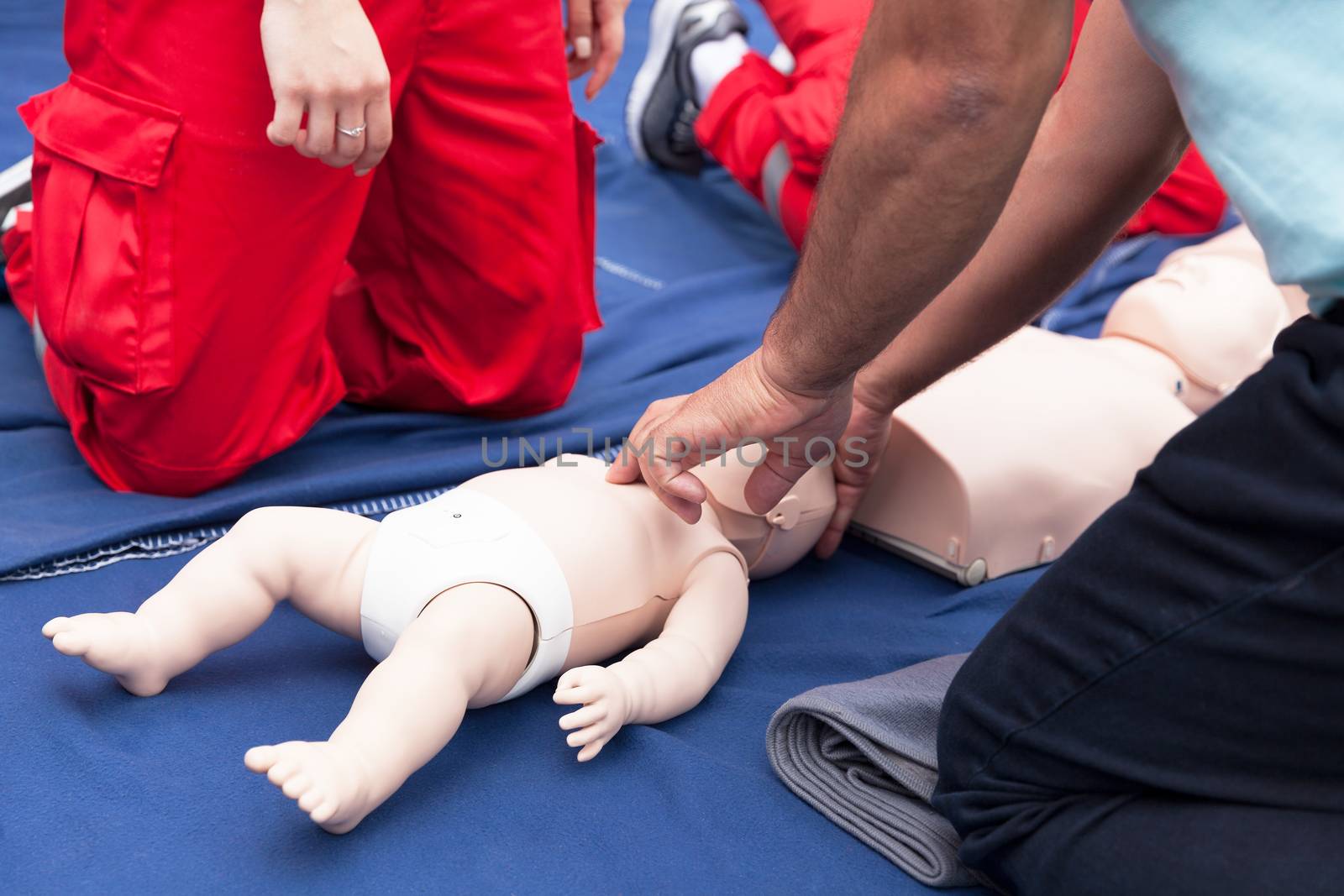 Cardiopulmonary resuscitation - CPR. Baby CPR dummy first aid training.