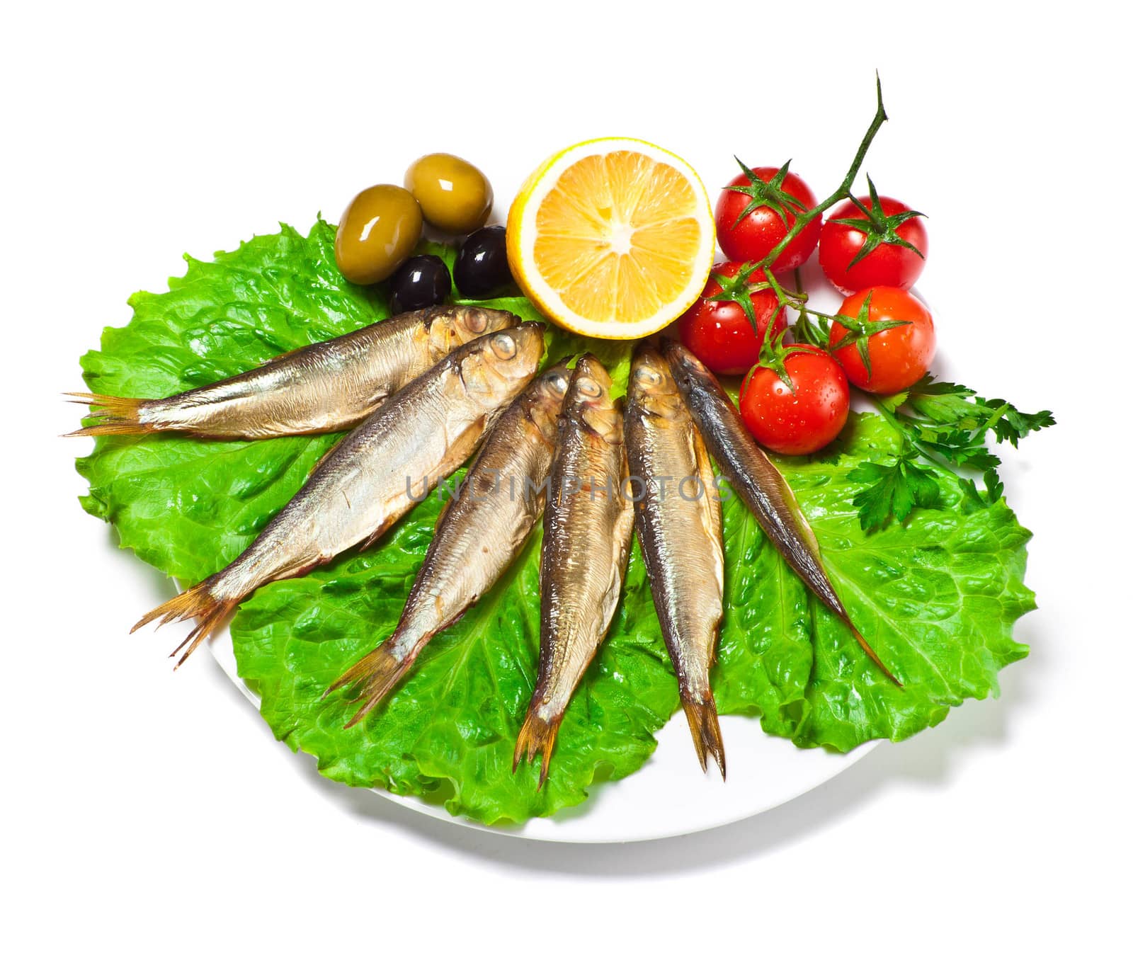 kipper fish on composition with vegetables