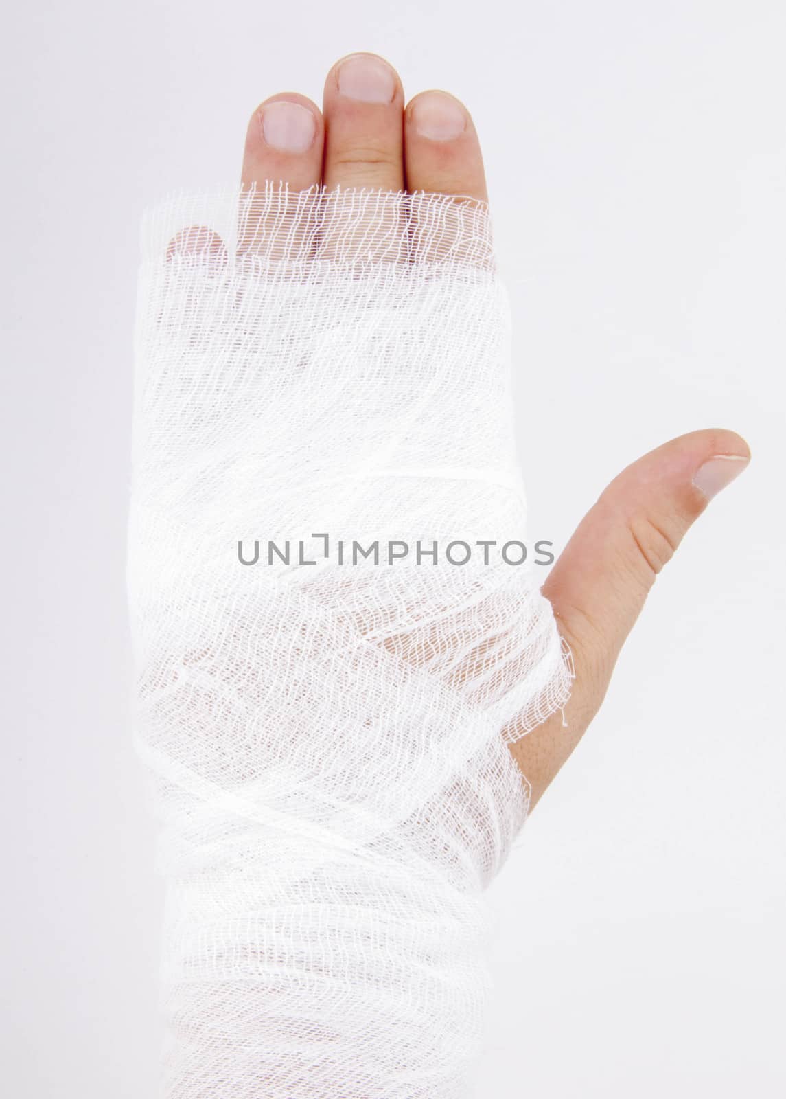 bandaged hand on white background