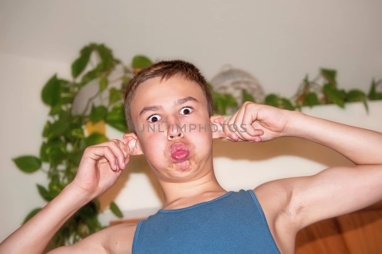 Young teenager making fun faces for the camera