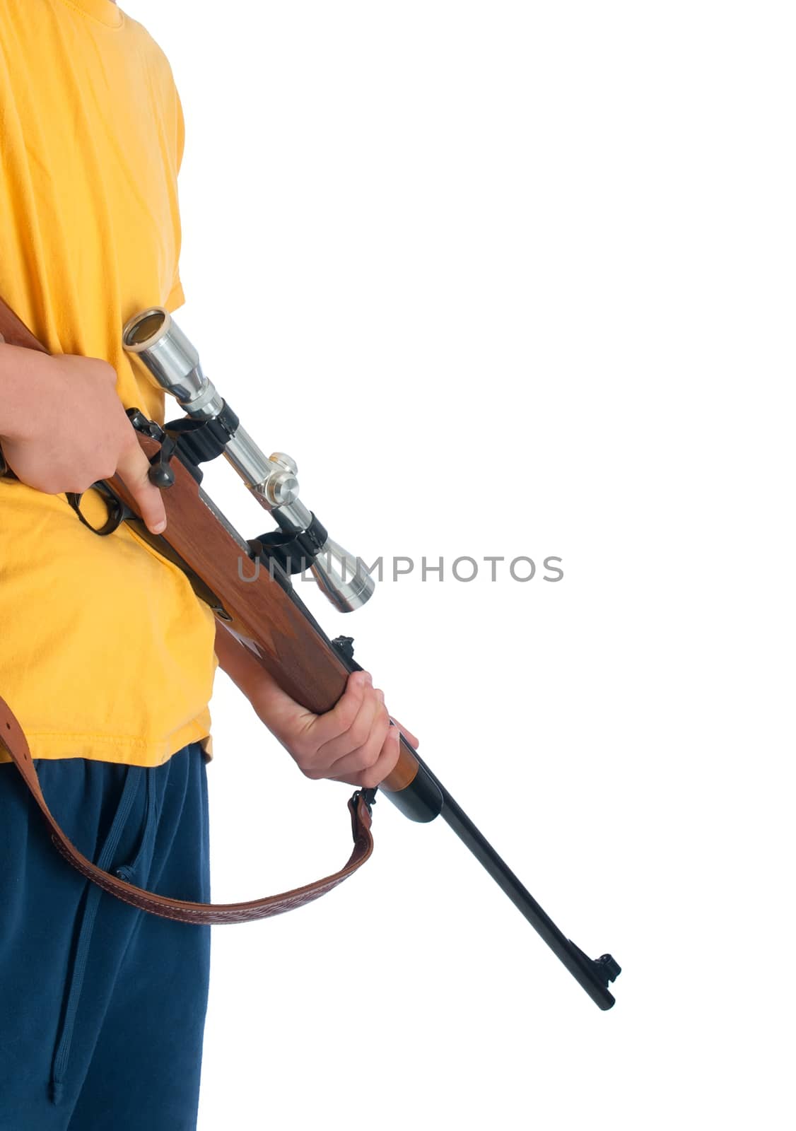 Young man holding a high power rifle with a scope. Isolated against a white background.