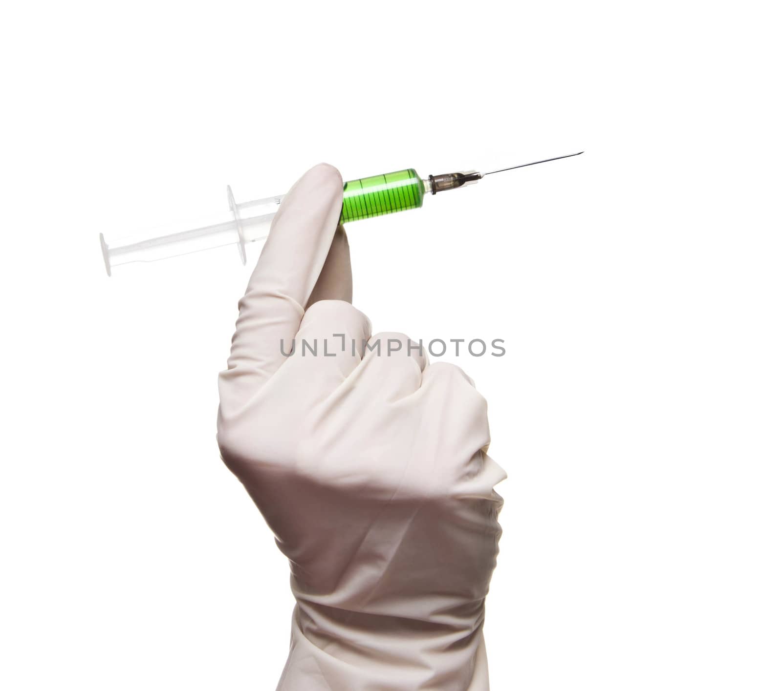 Hand holding syringe isolated on white