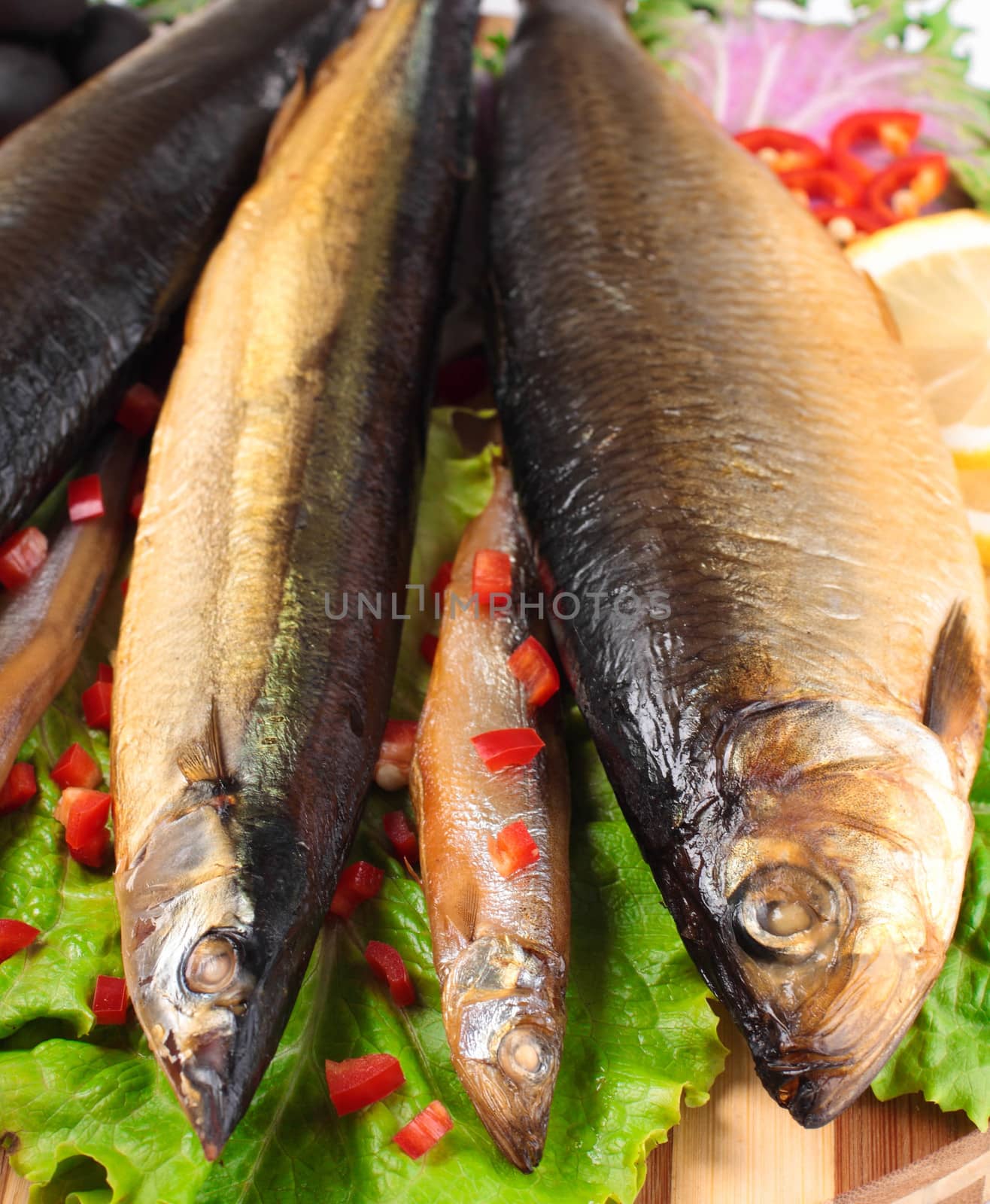 fish on plate with red pepper