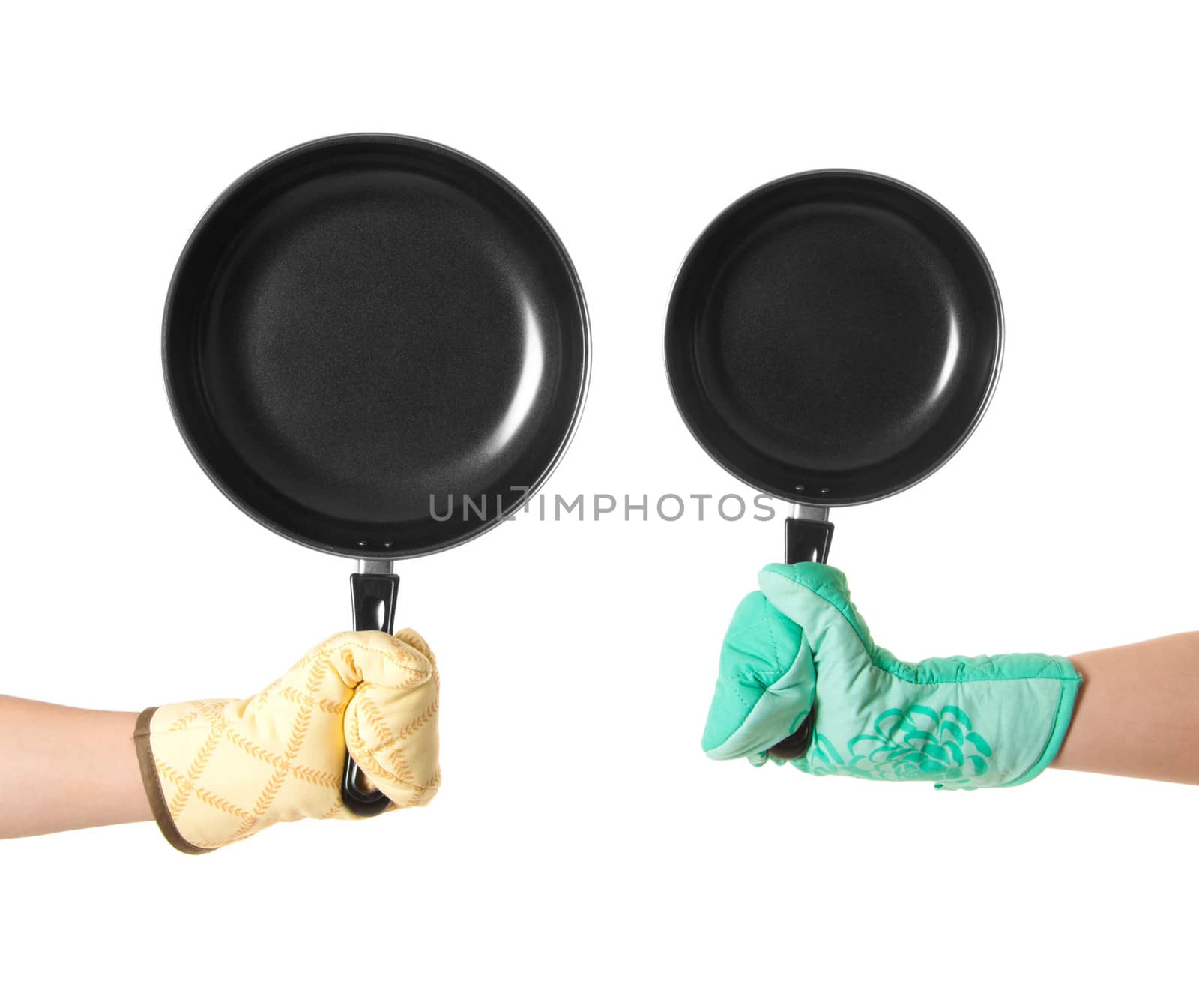 two hands in gloves holding pan's