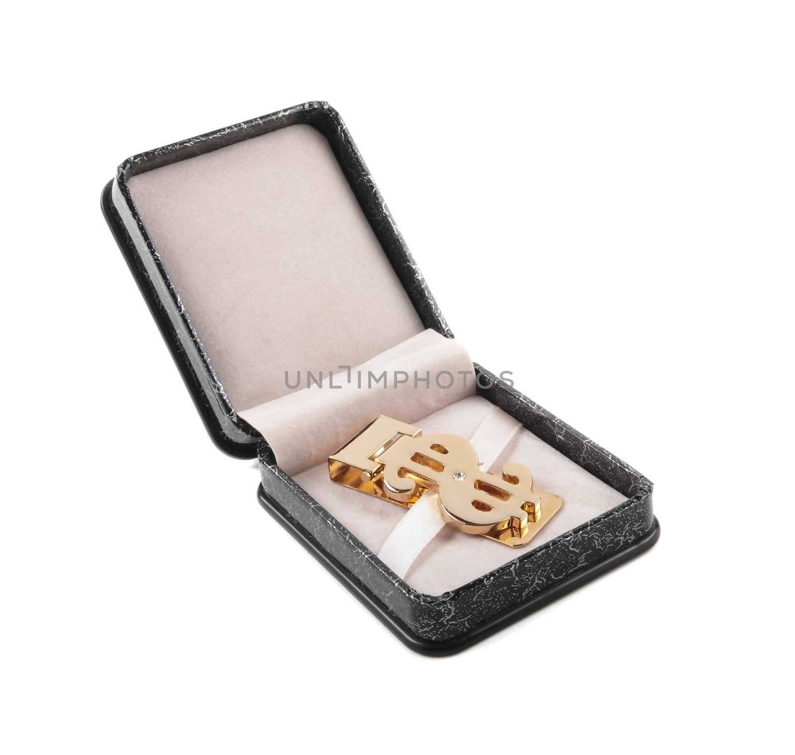 golden clip in box isolated