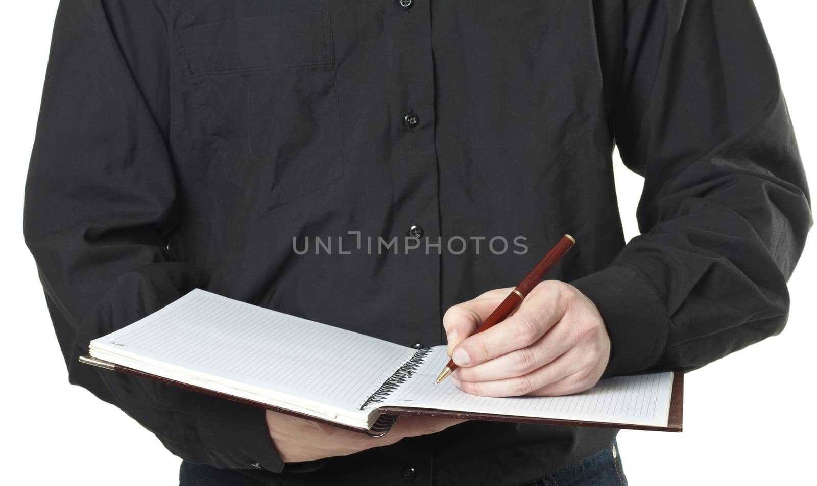 businessman taking note in a notepad