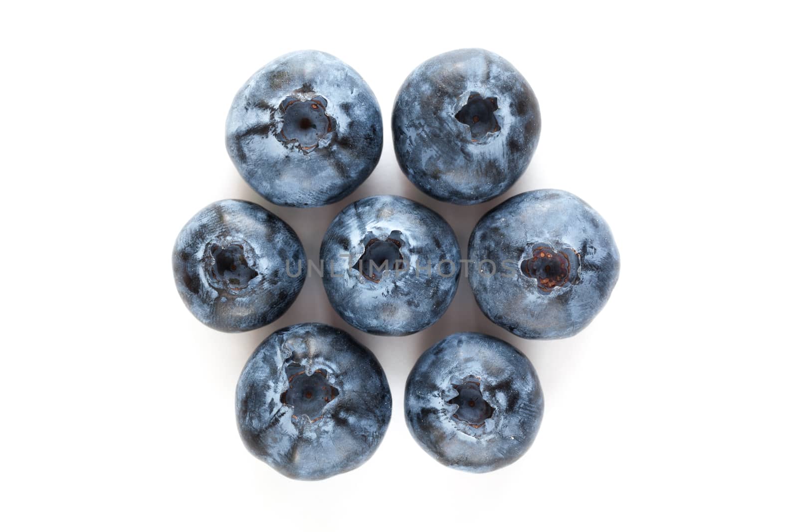 Freshly picked blueberries by Portokalis