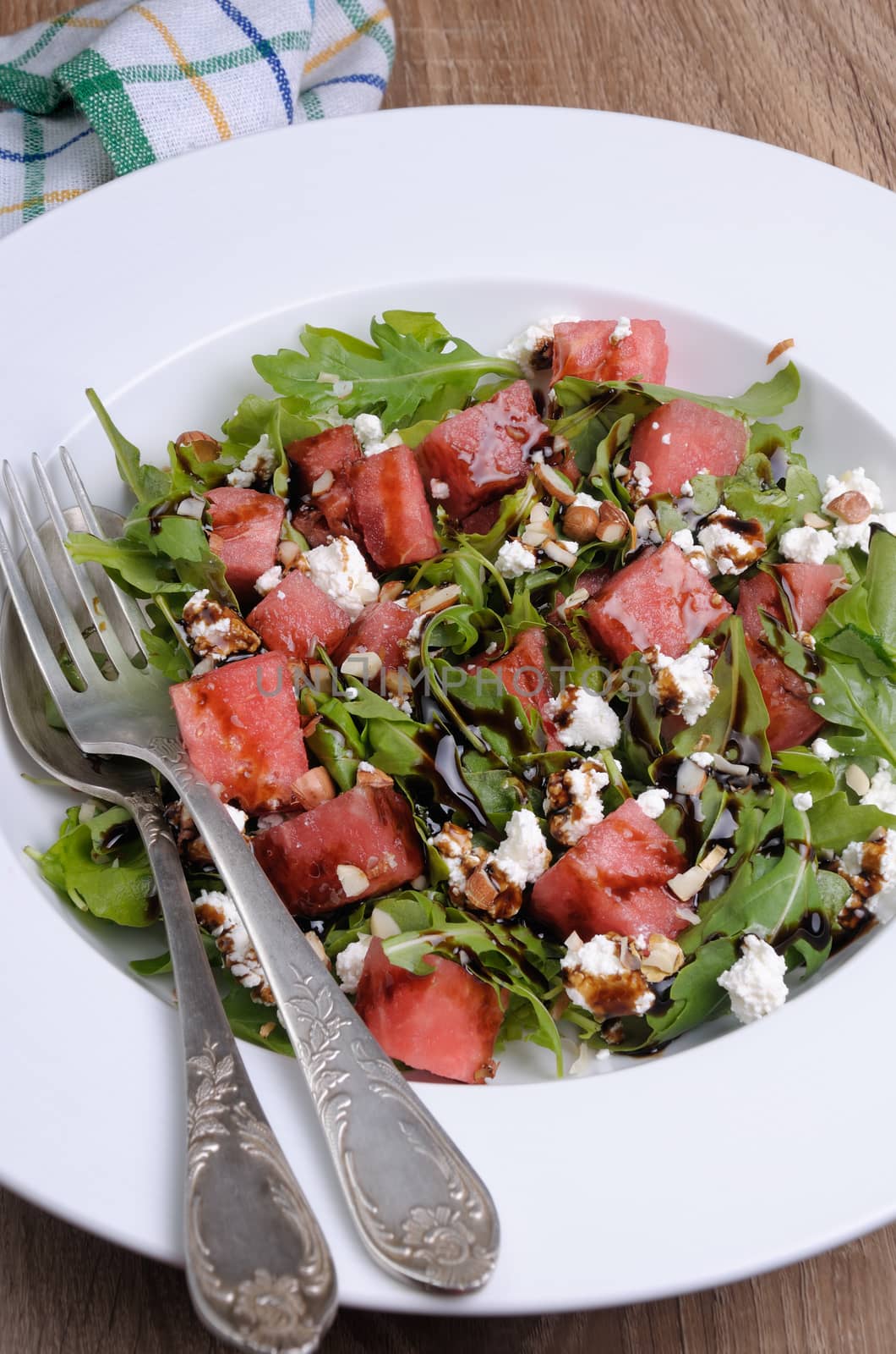 Arugula salad, ricotta cheese with watermelon slices,  balsamic soy sauce