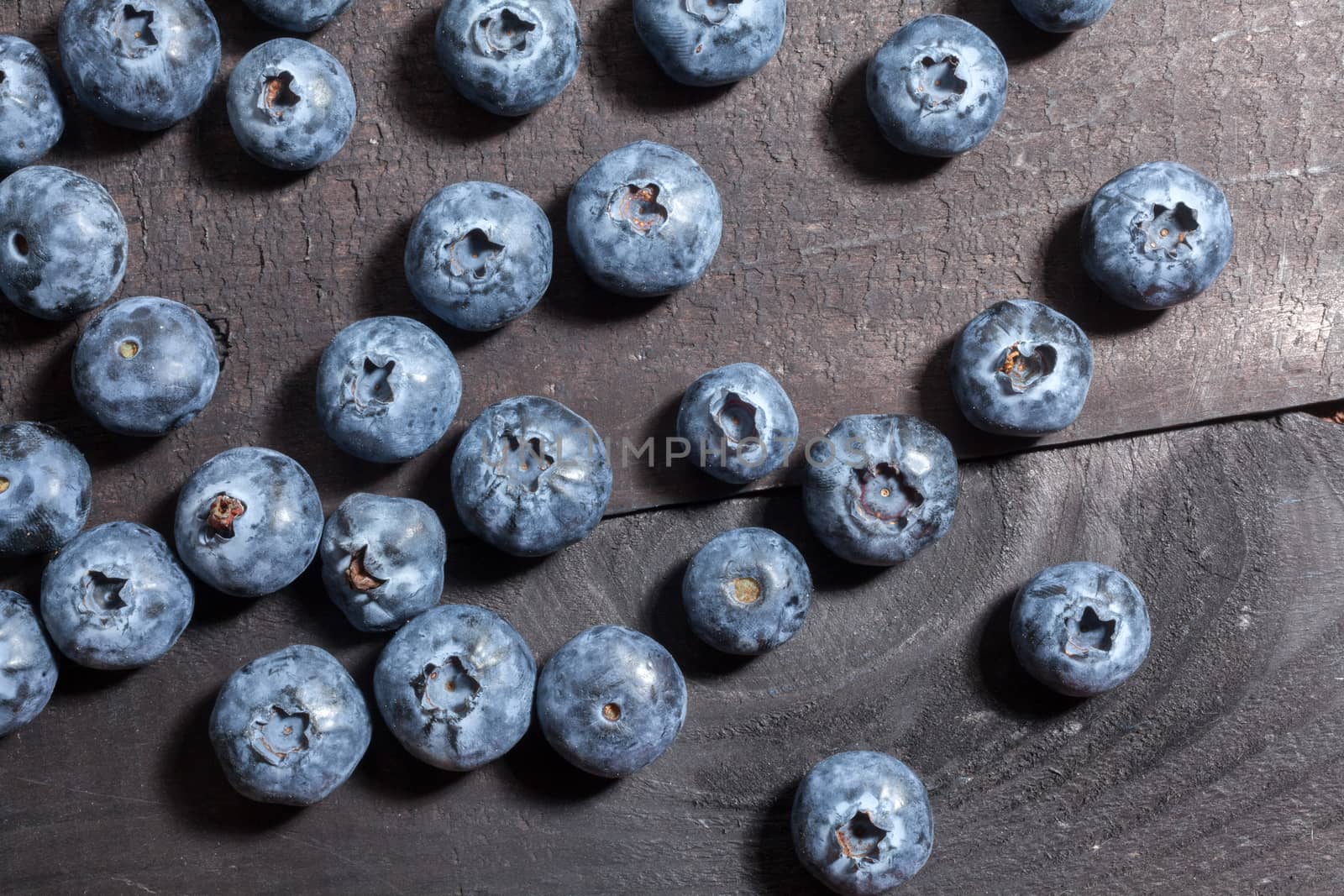 Blueberry on wooden table background