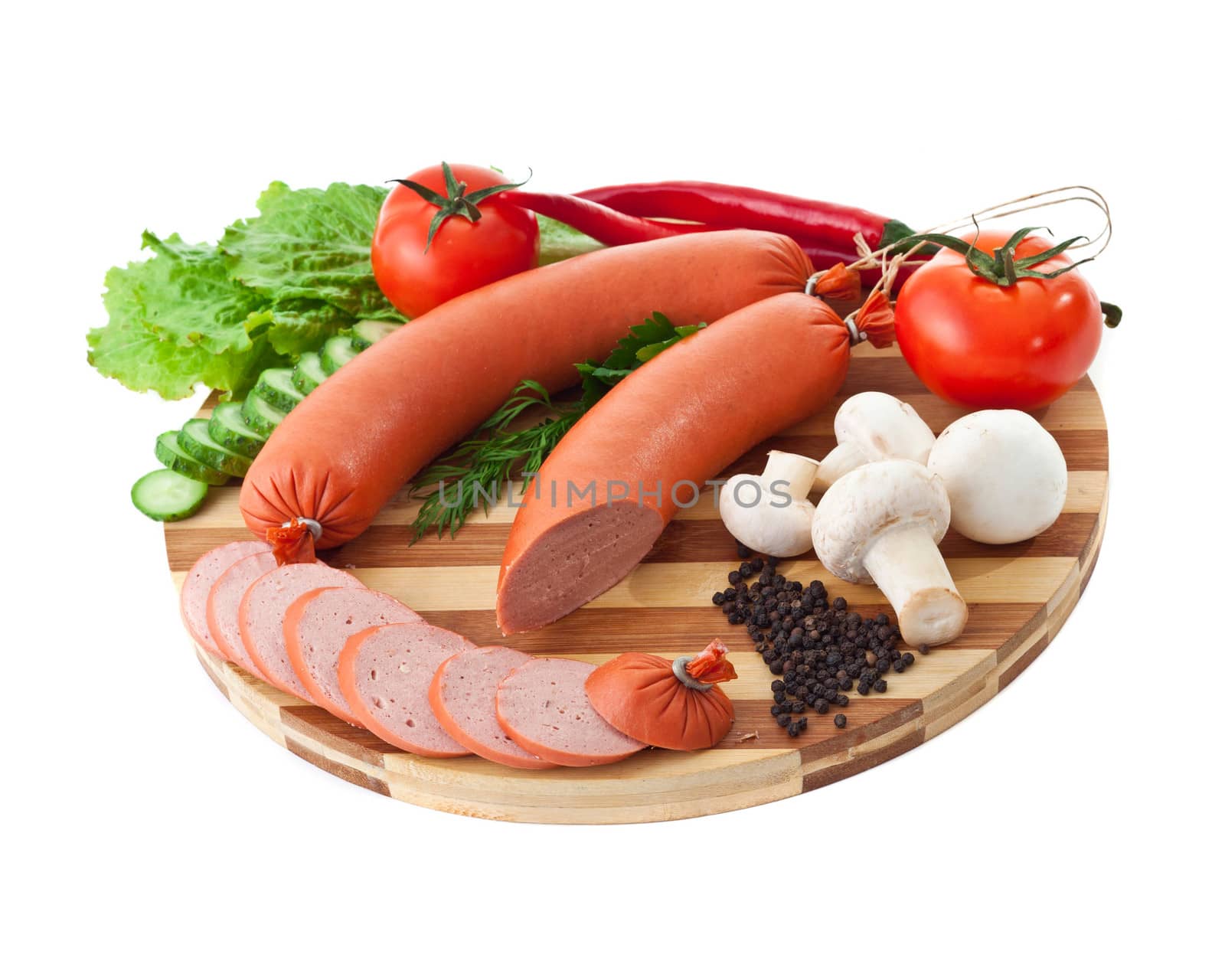 sausage on plate with vegetables