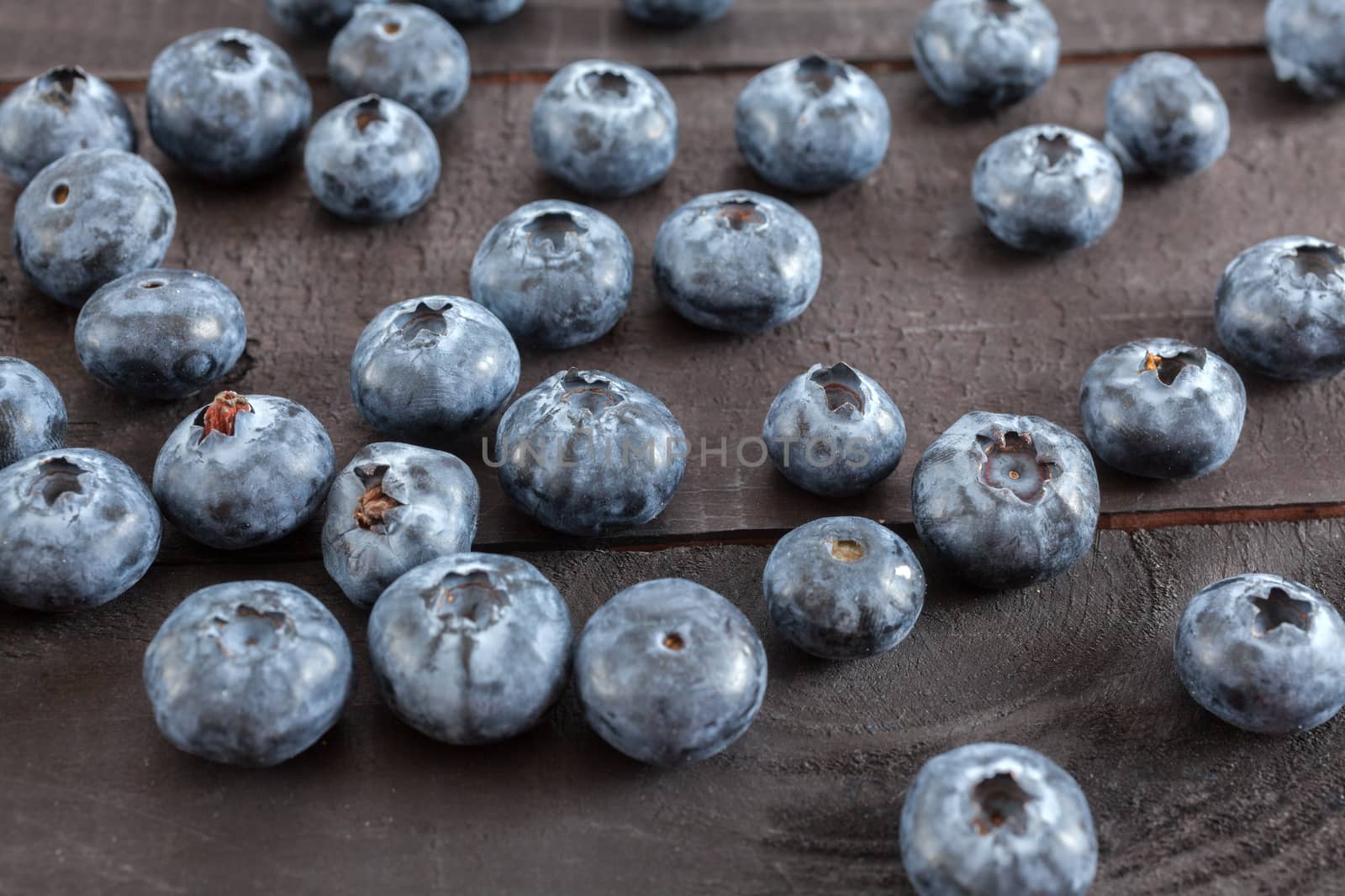 Blueberry on wooden table background