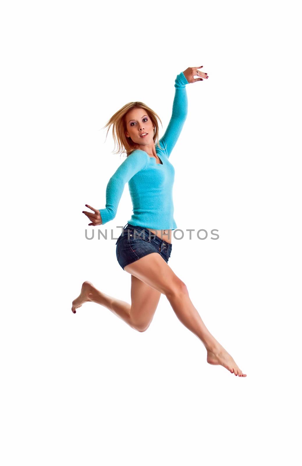 Beautiful young woman jumping isolated on white background.