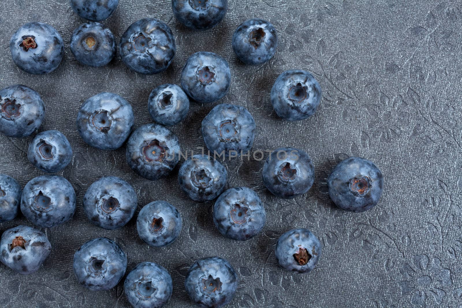 Freshly picked blueberries by Portokalis