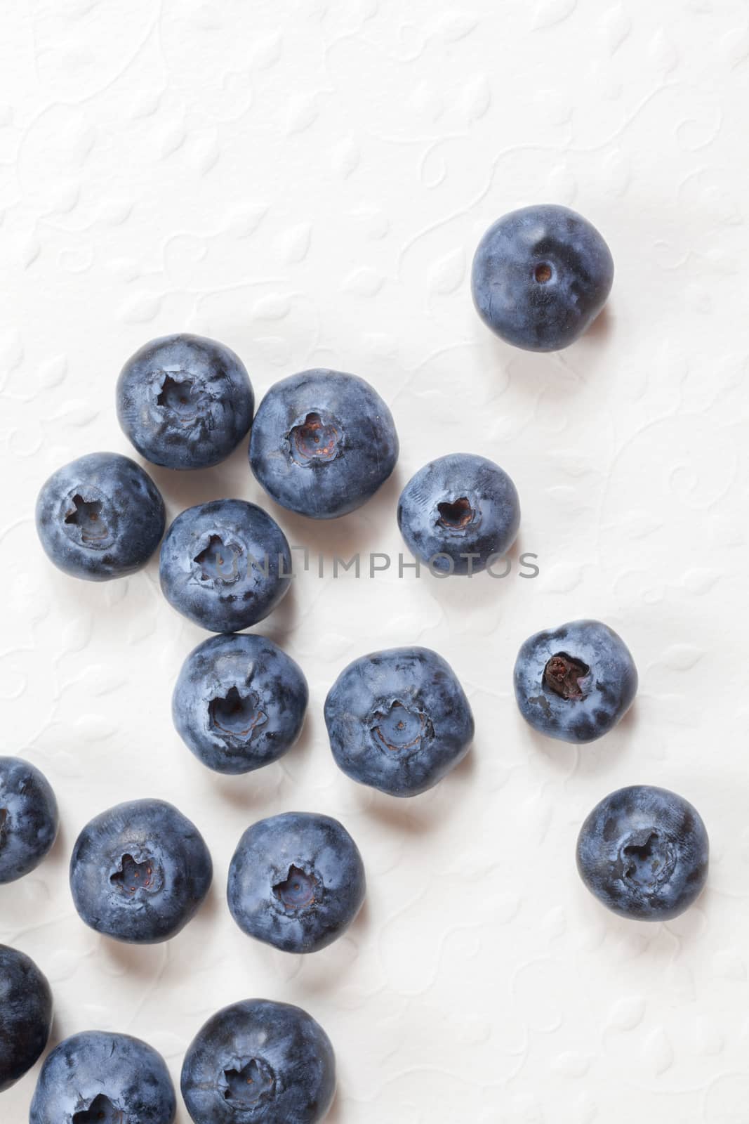 Freshly picked blueberries by Portokalis