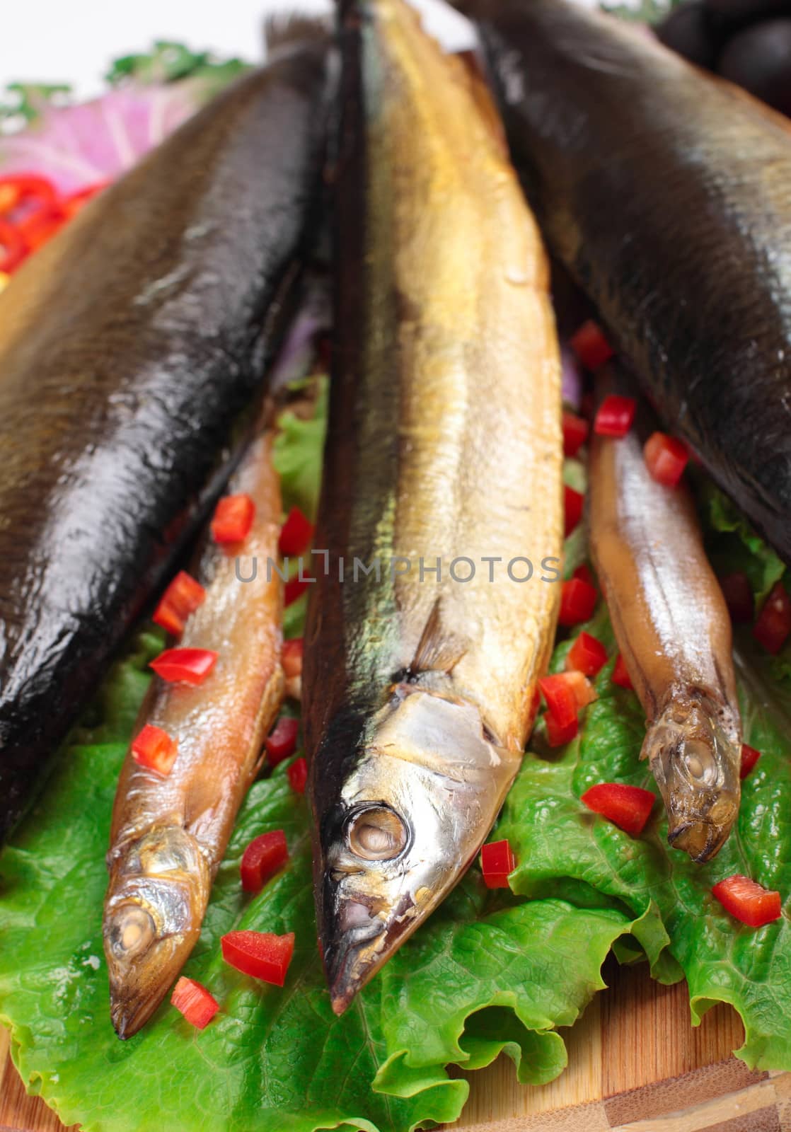 fish on plate with red pepper by shutswis