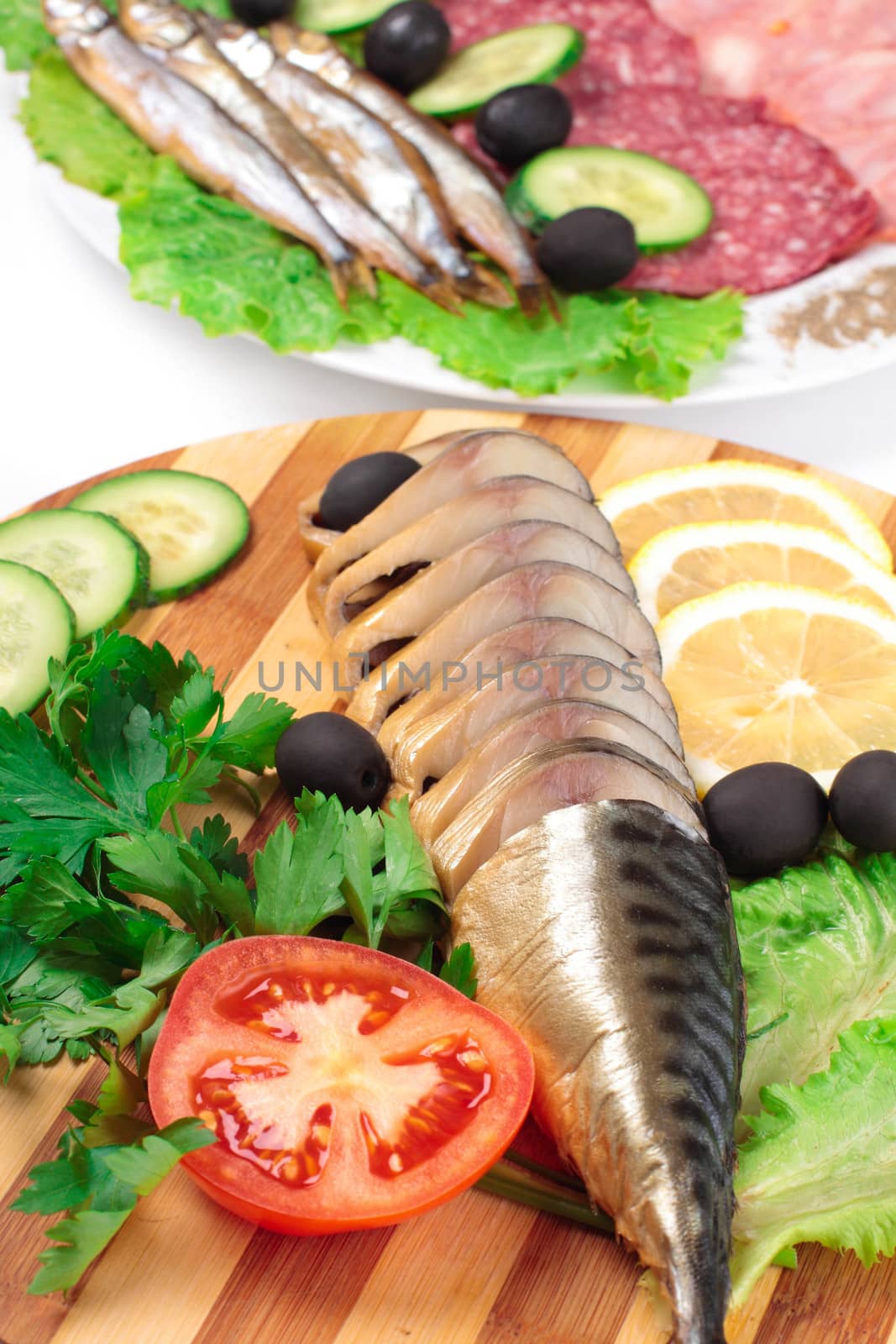 sliced herring on wooden plate by shutswis