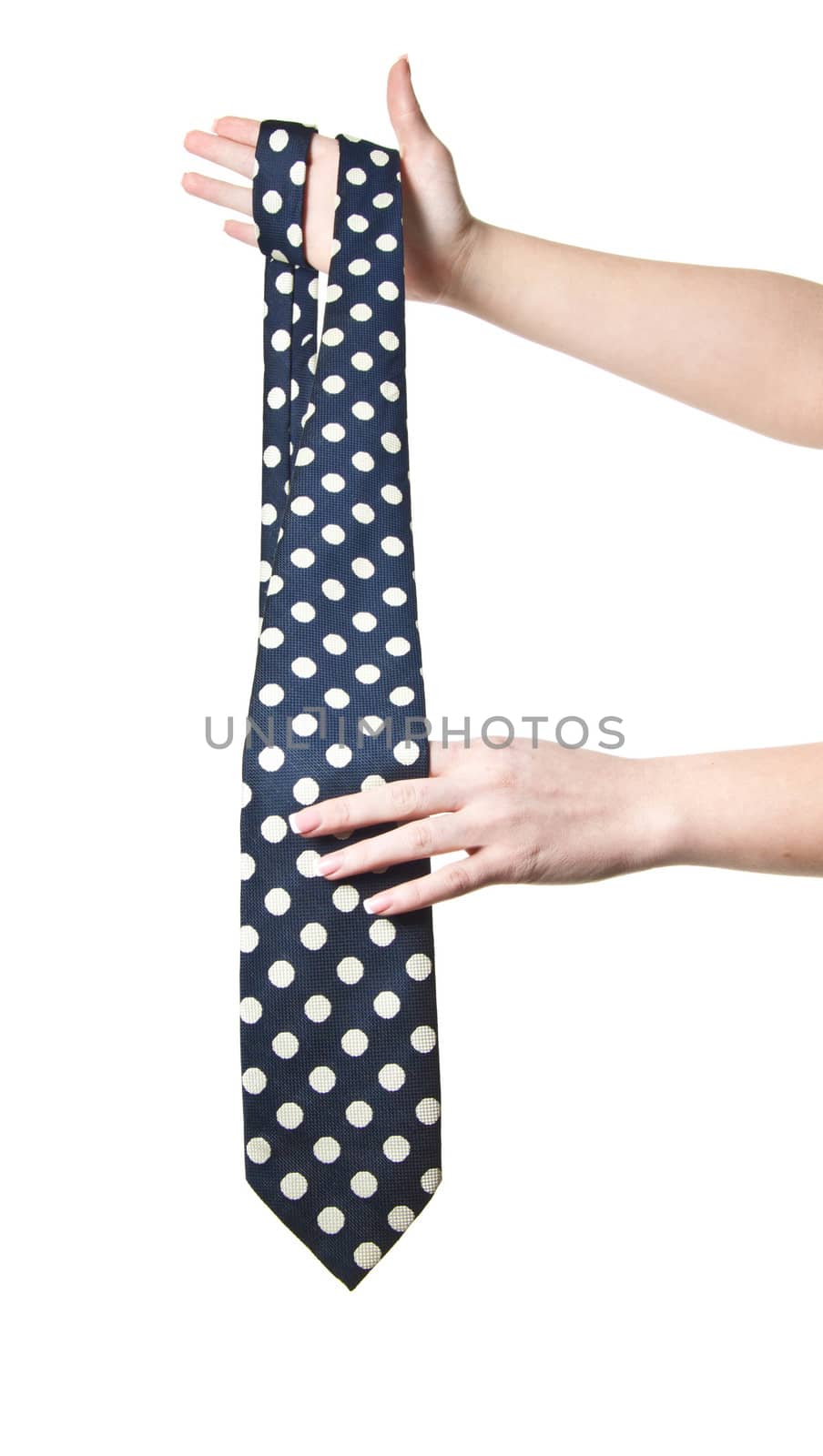 woman holding polka dot tie
