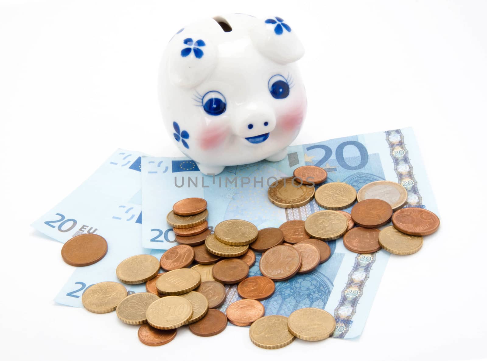 coins and euro with piggy bank by shutswis