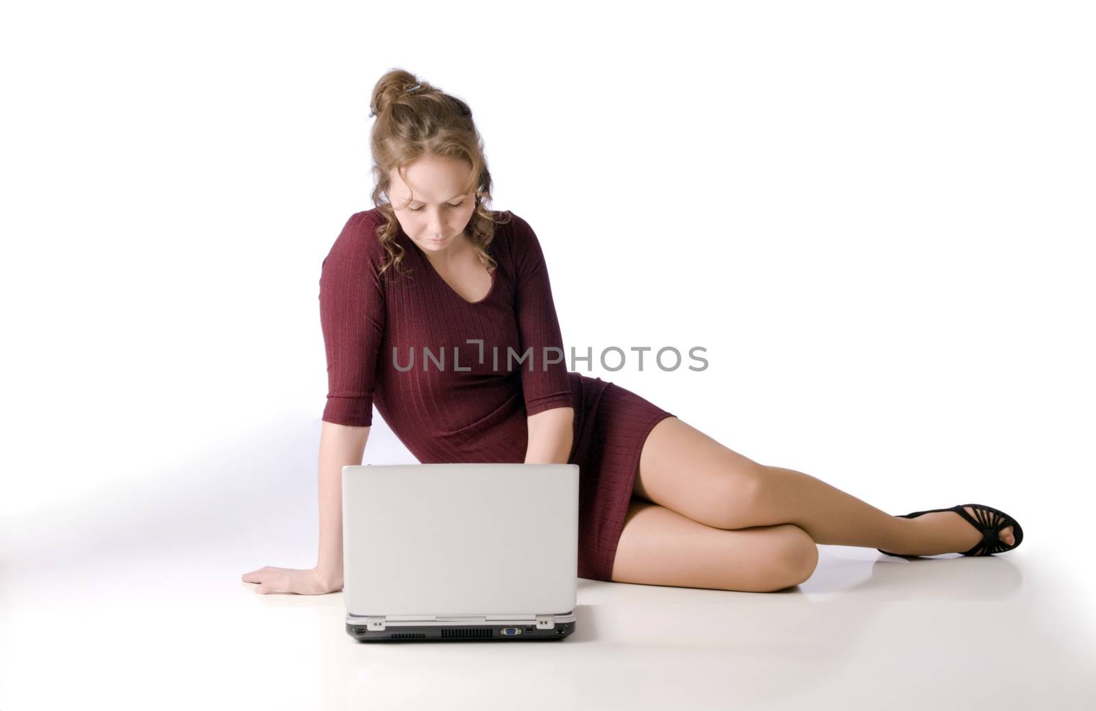 Sexy Young Woman Working On A Laptop by rcarner