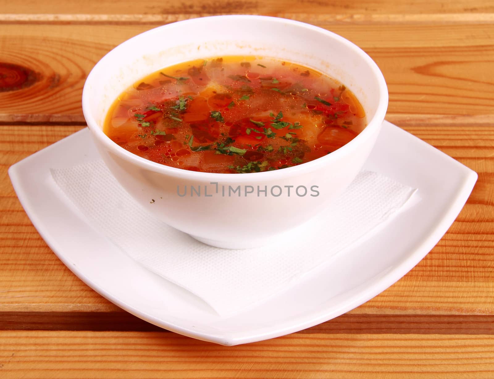 Bowl of Bright Red Creamy Tomato Soup with Yogurt by shutswis
