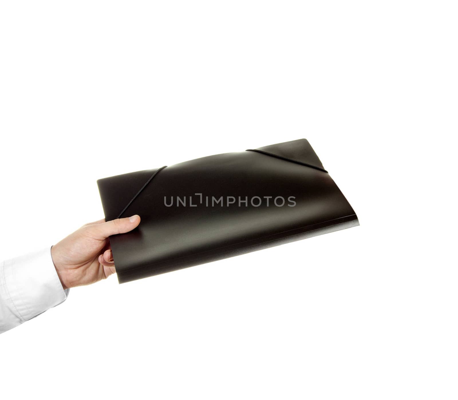 hand holding a folder